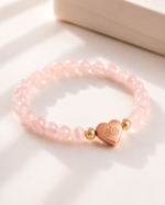 Rose Quartz Love Bracelet in soft warm light