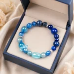 AVENSU blue crystal bracelet displayed in an open navy jewelry gift box
