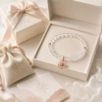 Clear quartz clarity and focus bracelet displayed in cream gift box with pouch card and crystal styling