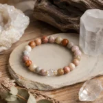 Mixed jasper grounding and balance bracelet styled with clear quartz crystals and natural wood