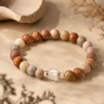 Mixed jasper grounding and balance bracelet with multicolor natural stone beads and clear faceted centerpiece