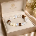 Mixed stone wood and crystal bead bracelet displayed in an open cream jewelry gift box