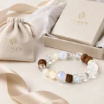 Mixed stone wood and crystal bead bracelet with cream jewelry box and drawstring pouch