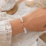 Moonstone intuition and new beginnings bracelet with rose gold crescent moon charm worn on wrist