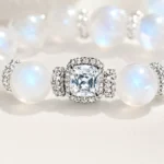 Close-up detail of moonstone square crystal bracelet with sparkling center stone