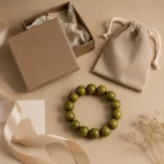 Olive green wood bead bracelet with jewelry box pouch ribbon and gift cards