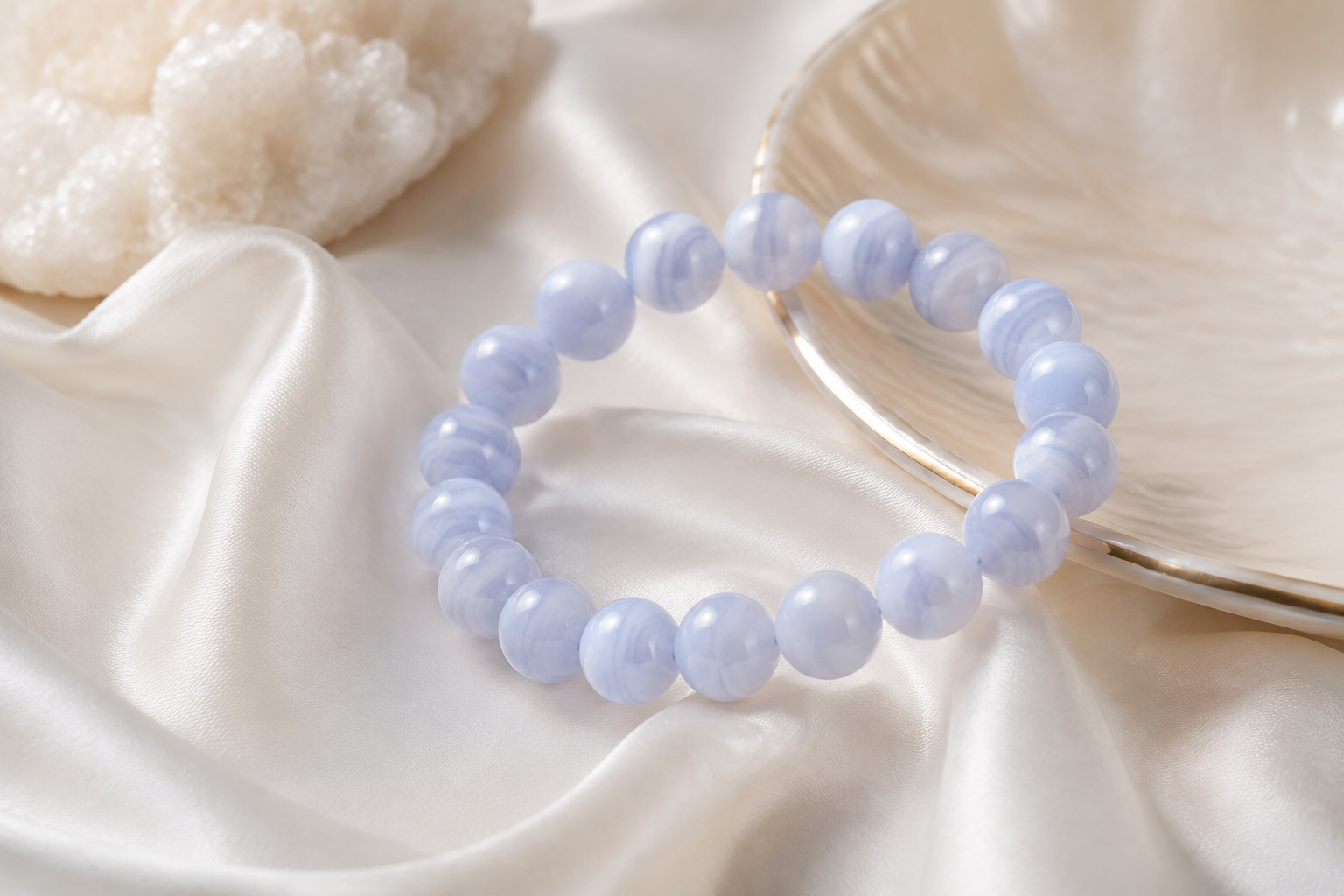 Blue lace agate pale blue striped bead bracelet on ivory silk with a pearl-toned dish